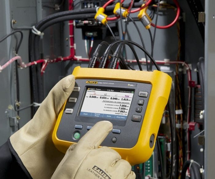 Fluke energy logger connected to a panel during an audit