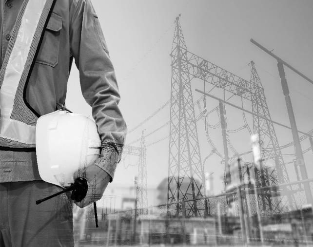 Electrical engineer on site near a substation